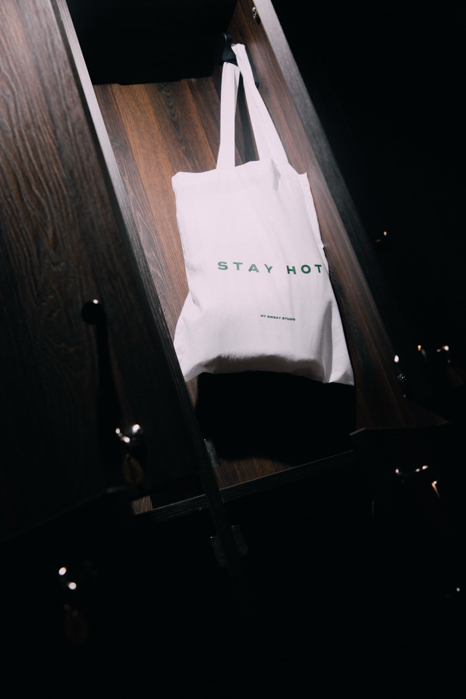 HY tote bag detail in a locker