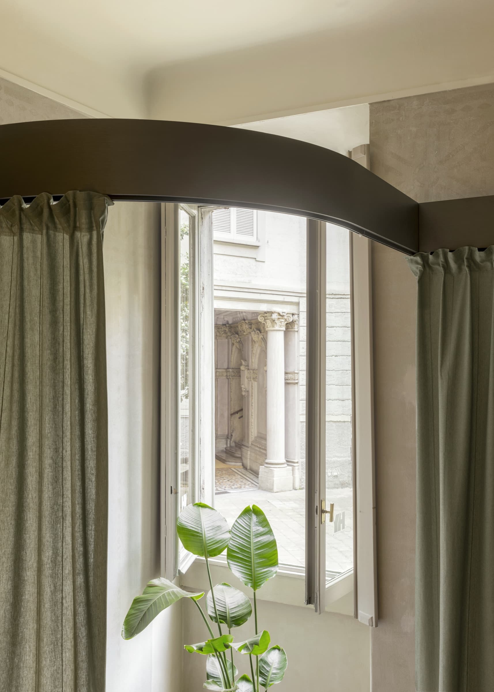 Historic window and curtain detail at HY Brera